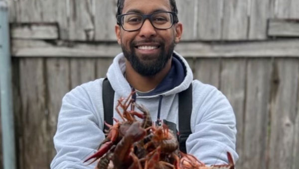 man-holding-crawfish